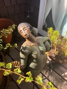 Woman w: the world at her back